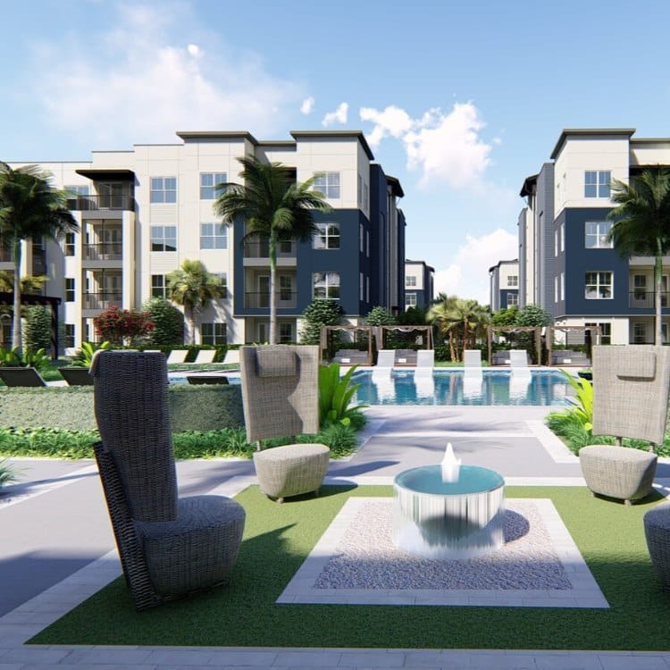 Outdoor view of the pool and apartment buildings at Vue at the Ridge apartments for rent in Apopka