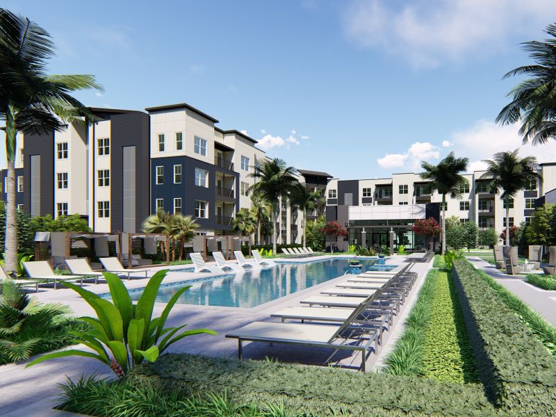 Pool with loungers at Vue at the Ridge Apopka apartments